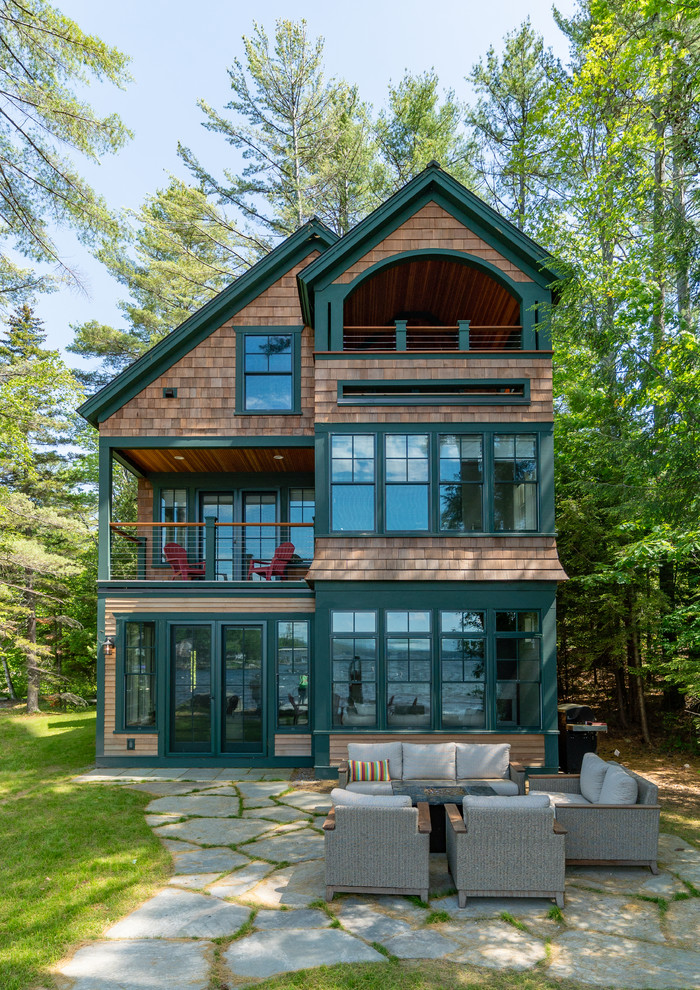 Large arts and crafts brown three-story wood gable roof photo in Boston