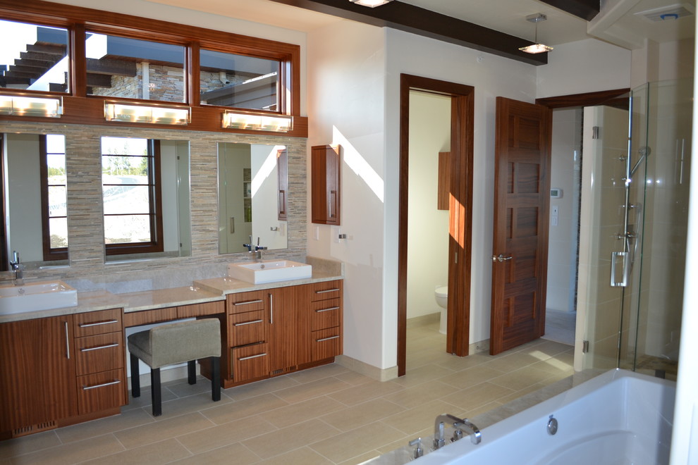 Bathroom - large contemporary master stone tile ceramic tile and beige floor bathroom idea in Other with flat-panel cabinets, medium tone wood cabinets, a two-piece toilet, white walls, a vessel sink, quartzite countertops, a hinged shower door and beige countertops