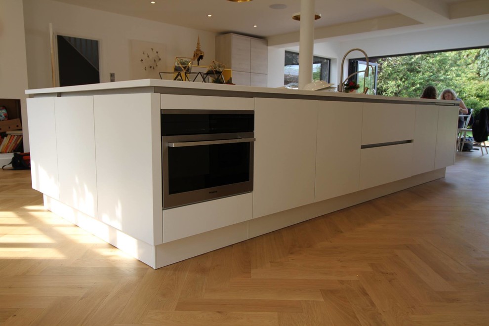 Photo of a contemporary kitchen in Sussex.