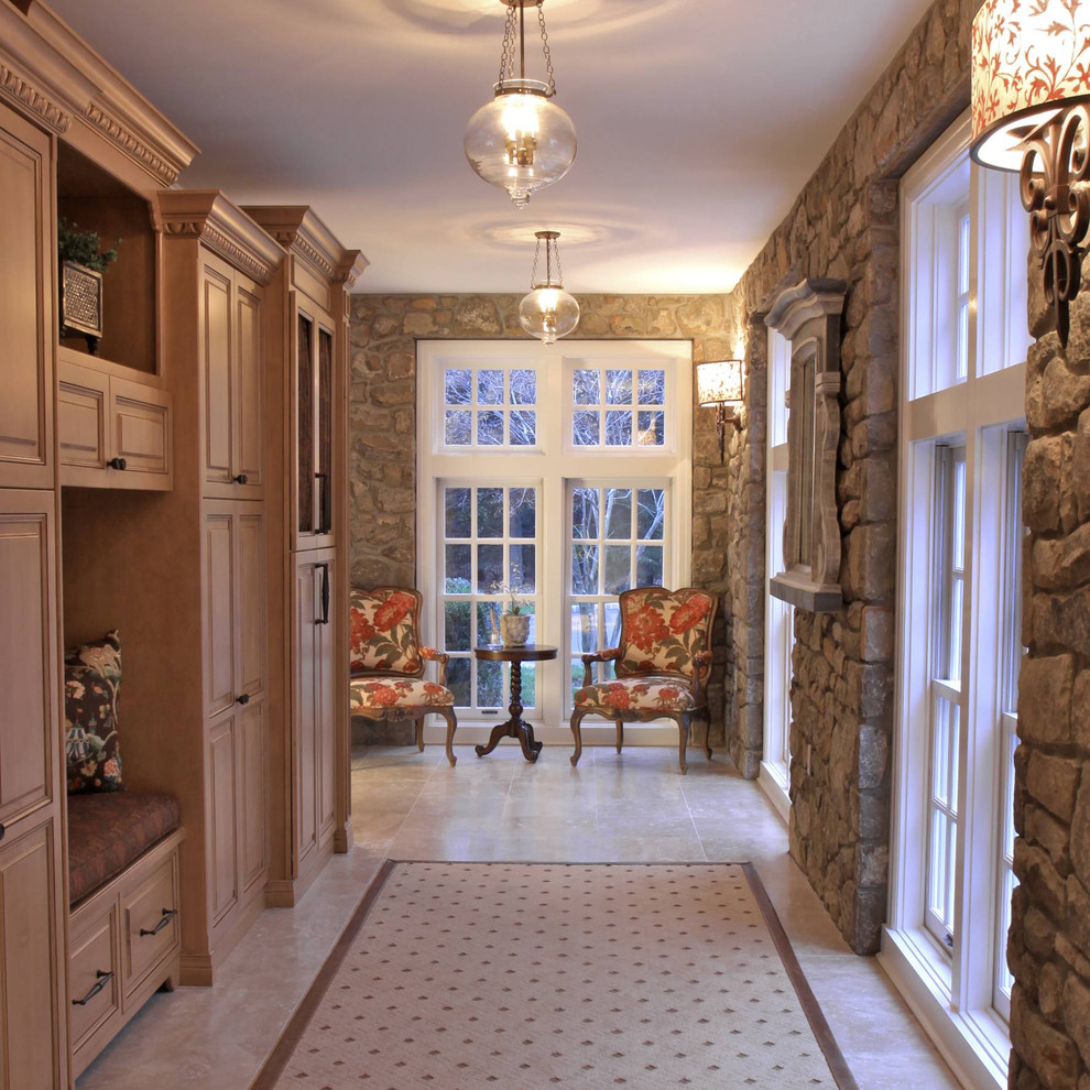 Large traditional hallway in Philadelphia with porcelain floors.