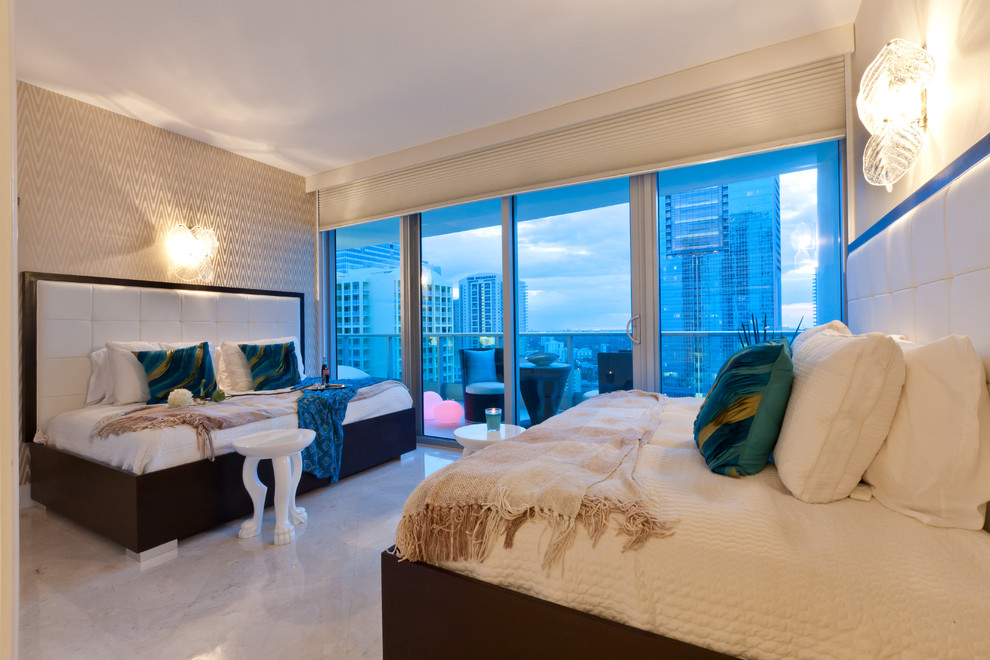 Design ideas for a contemporary guest bedroom in Miami with multi-coloured walls and marble floors.