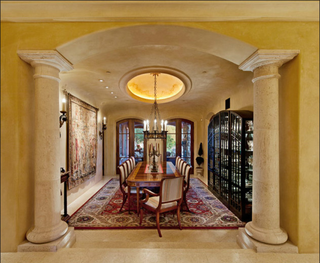 Design ideas for a large traditional separate dining room in Santa Barbara with limestone floors.