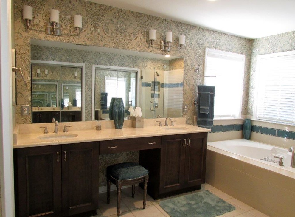 Inspiration for a large traditional master bathroom in Raleigh with dark wood cabinets, a hot tub, beige tile, ceramic tile, multi-coloured walls and ceramic floors.