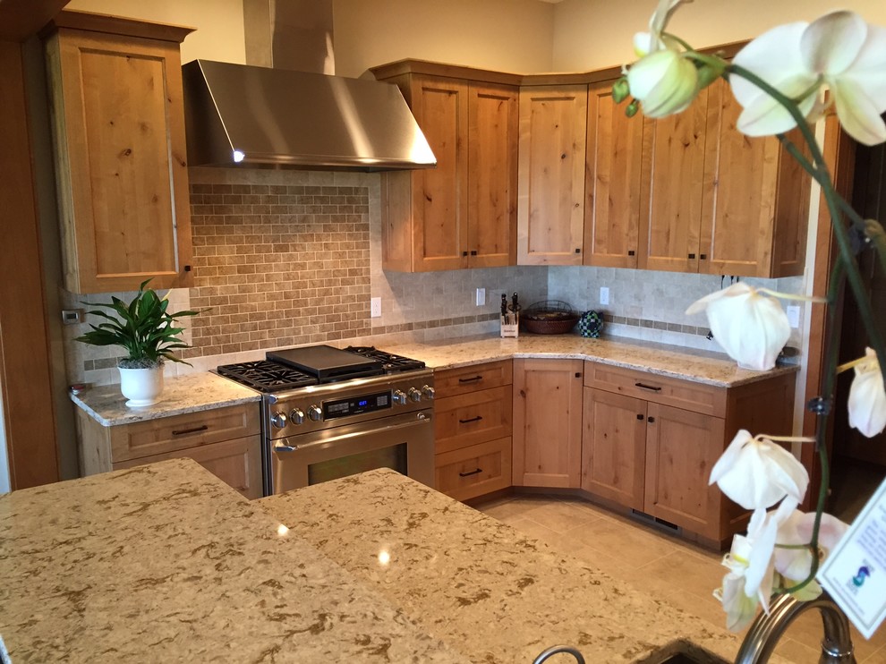 Inspiration for a large transitional ceramic tile kitchen remodel in Seattle with ceramic backsplash, a double-bowl sink, shaker cabinets, medium tone wood cabinets and beige backsplash