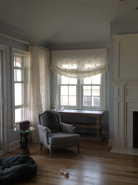 After Photo - Luxurious Drapes and Sweeping Relaxed Roman Shades klassisk-sovrum