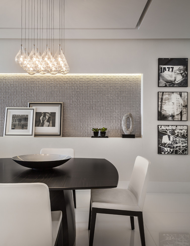 Photo of a mid-sized contemporary open plan dining in Miami with white walls, porcelain floors, no fireplace and white floor.