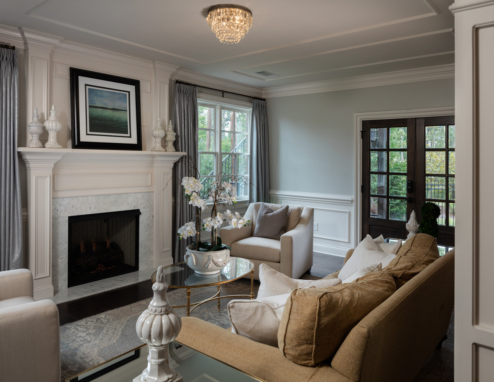 Design ideas for a large traditional walk-out basement in Atlanta with grey walls, dark hardwood floors, a standard fireplace, a stone fireplace surround, brown floor, a home bar and coffered.