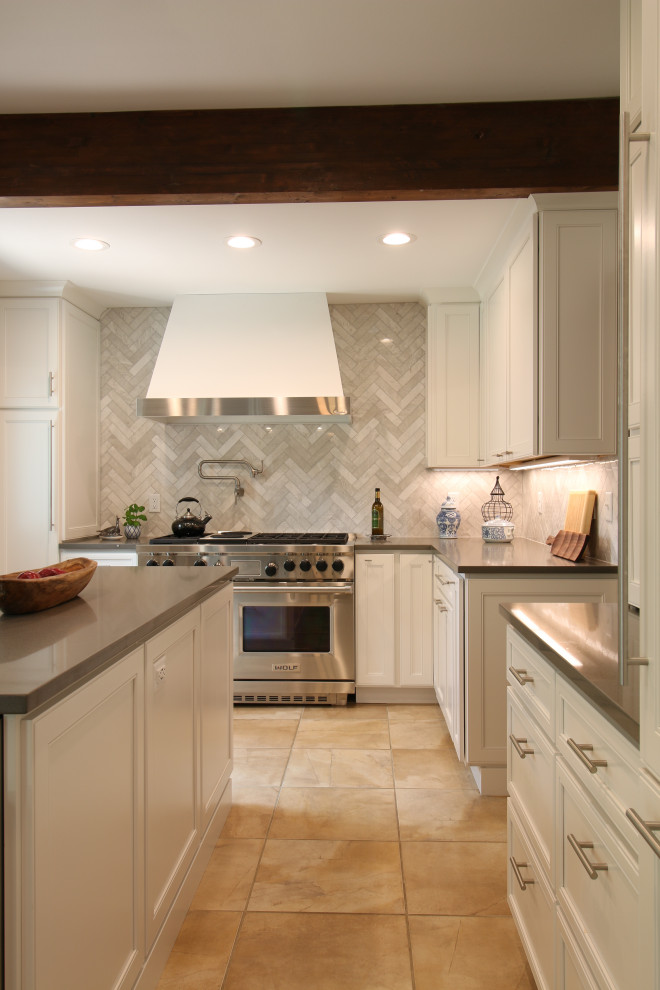 Inspiration for a mid-sized u-shaped ceramic tile, beige floor and exposed beam eat-in kitchen remodel in Denver with a single-bowl sink, flat-panel cabinets, white cabinets, quartz countertops, gray backsplash, marble backsplash, stainless steel appliances, an island and gray countertops