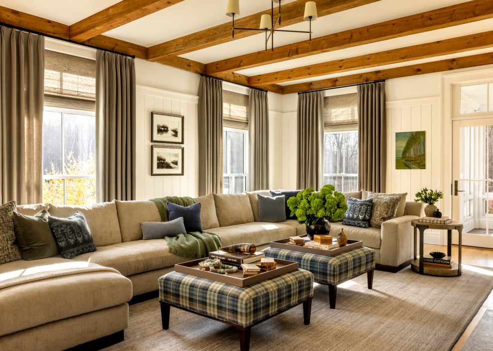 Example of a country family room design in New York