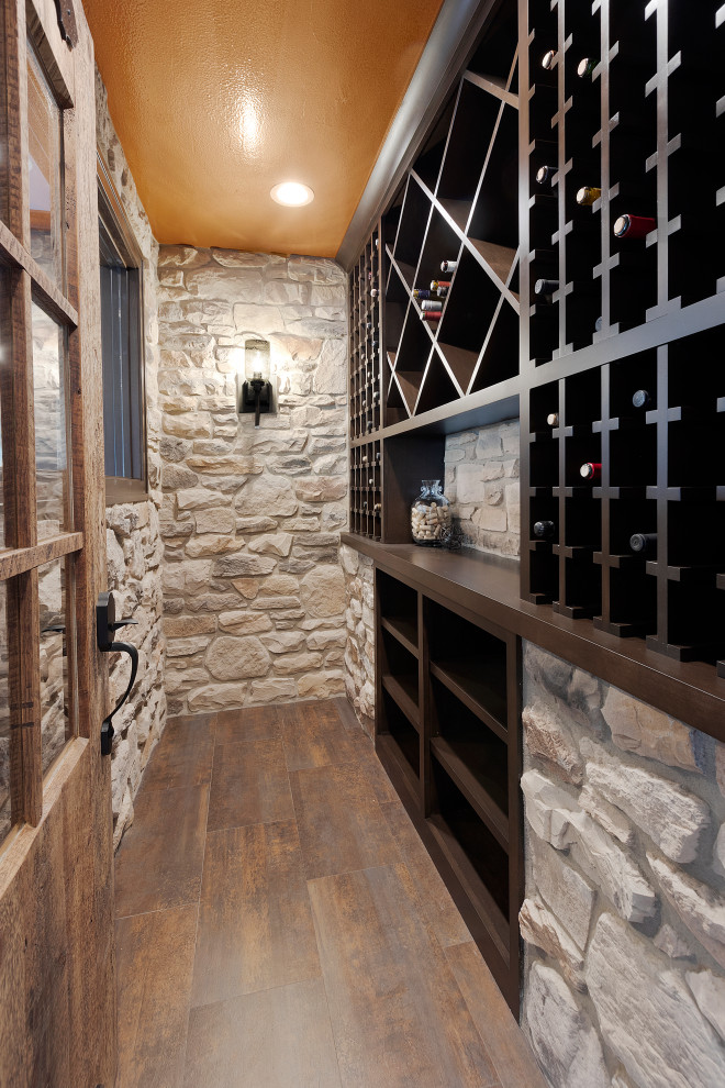 Example of a small transitional vinyl floor wine cellar design with diamond bins