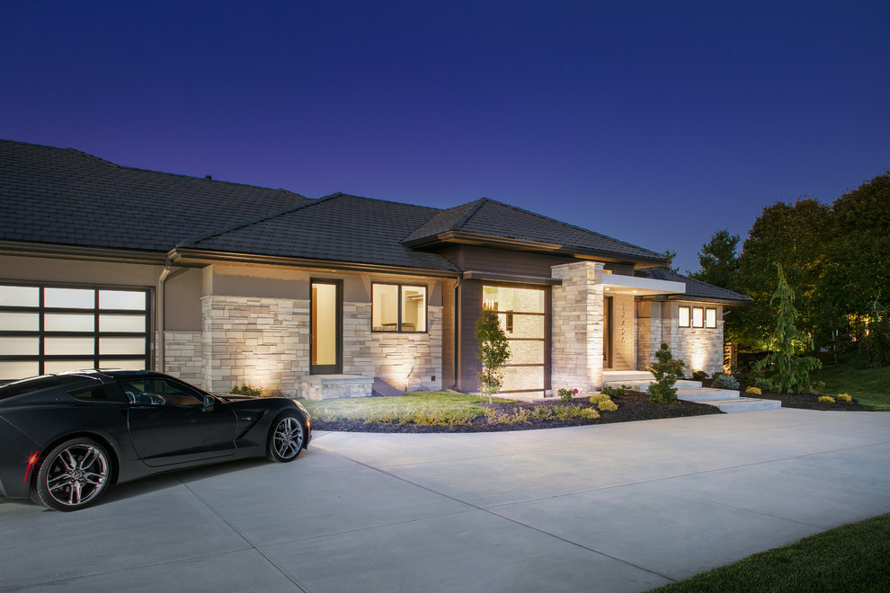 Mid-sized transitional beige one-story mixed siding house exterior idea in Omaha with a hip roof and a shingle roof