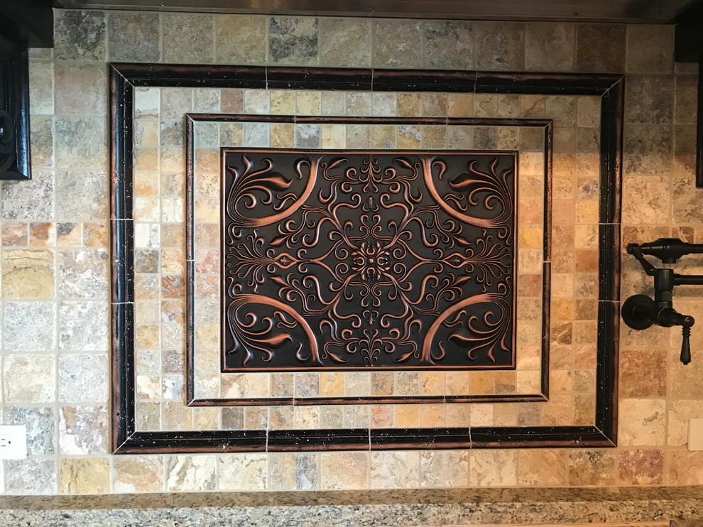 Inspiration for a rustic eat-in kitchen remodel in Austin with travertine backsplash