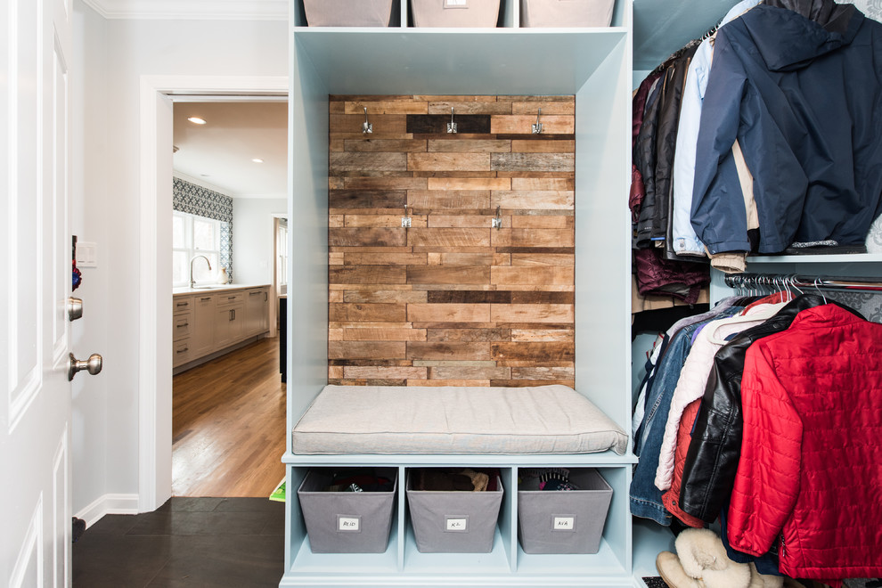 Inspiration for a small traditional mudroom in DC Metro with slate floors and black floor.