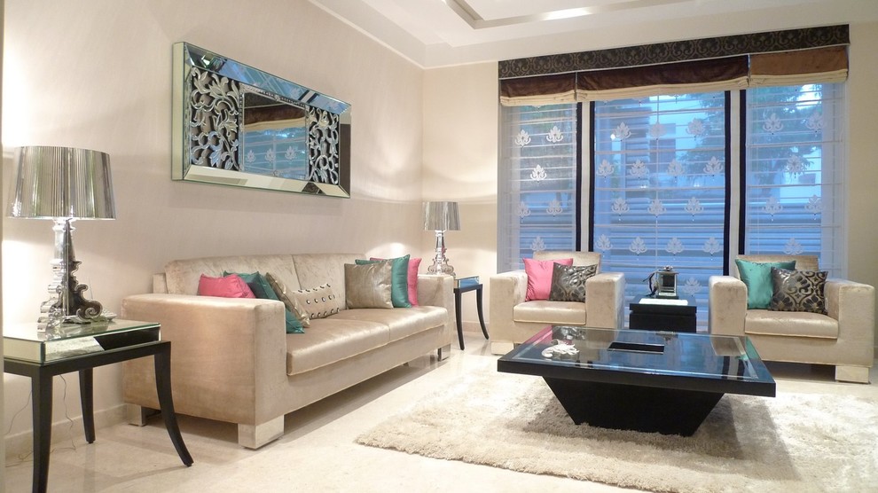 Design ideas for a contemporary living room in Bengaluru with beige walls.
