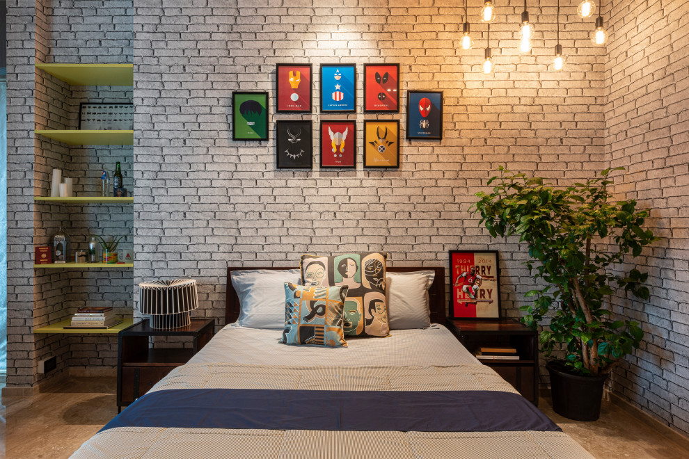 Photo of an industrial bedroom in Mumbai with grey walls, concrete floors and grey floor.