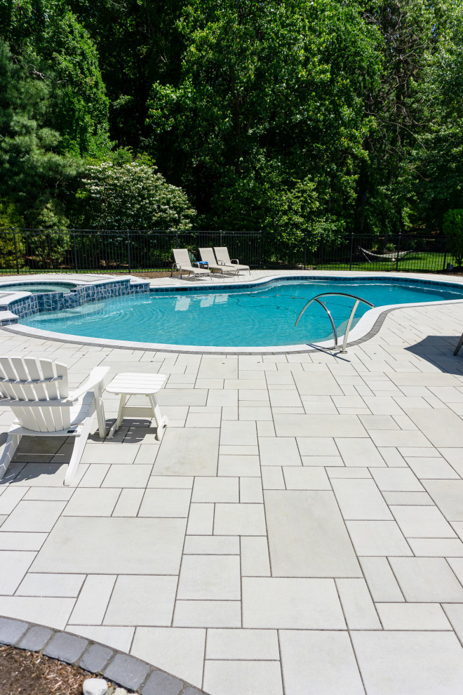 Holmdel, NJ: Paver Patio Installation Surrounding Inground Pool