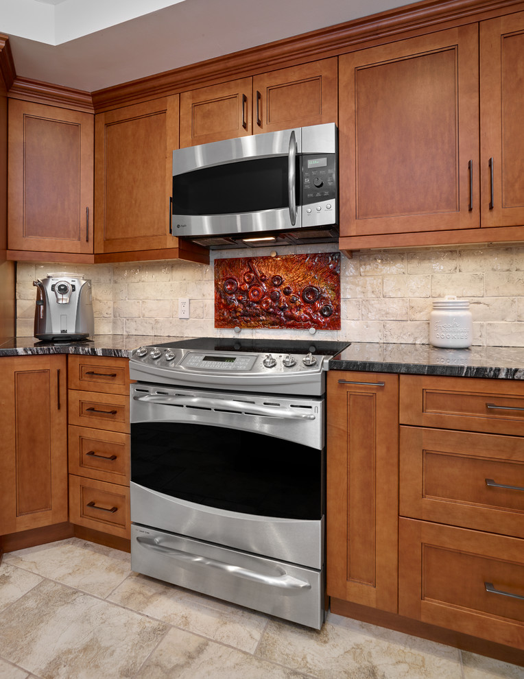 Example of a transitional kitchen design in Edmonton