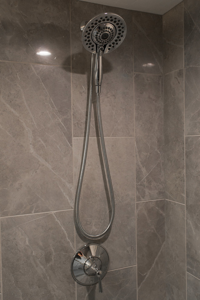 Small transitional gray tile and porcelain tile porcelain tile alcove shower photo in Miami with a two-piece toilet and an undermount sink