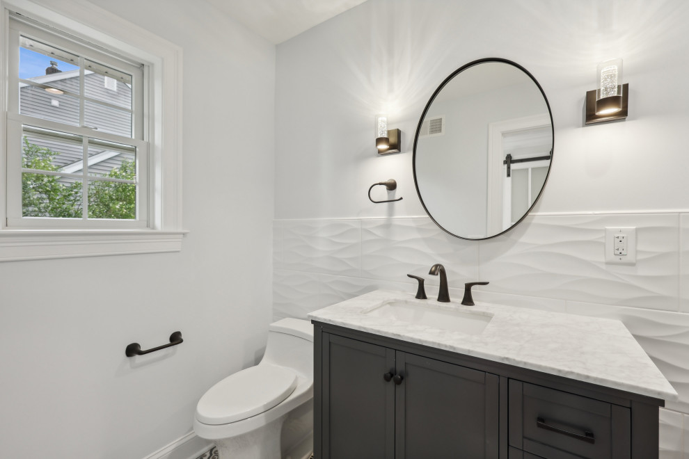 Bathroom with 3D Wave Tile and Round Mirror