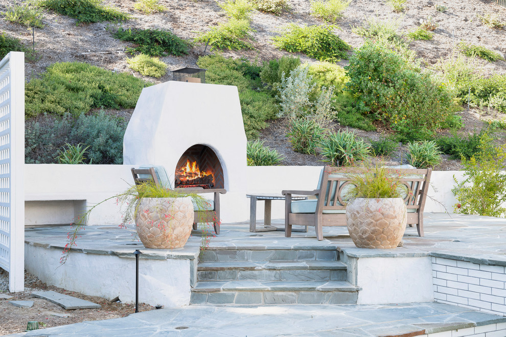 Design ideas for a coastal patio in Orange County.