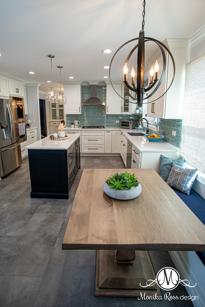 Eat-in kitchen - large coastal u-shaped vinyl floor and gray floor eat-in kitchen idea in Chicago with an undermount sink, shaker cabinets, white cabinets, quartz countertops, blue backsplash, ceramic backsplash, stainless steel appliances, an island and white countertops