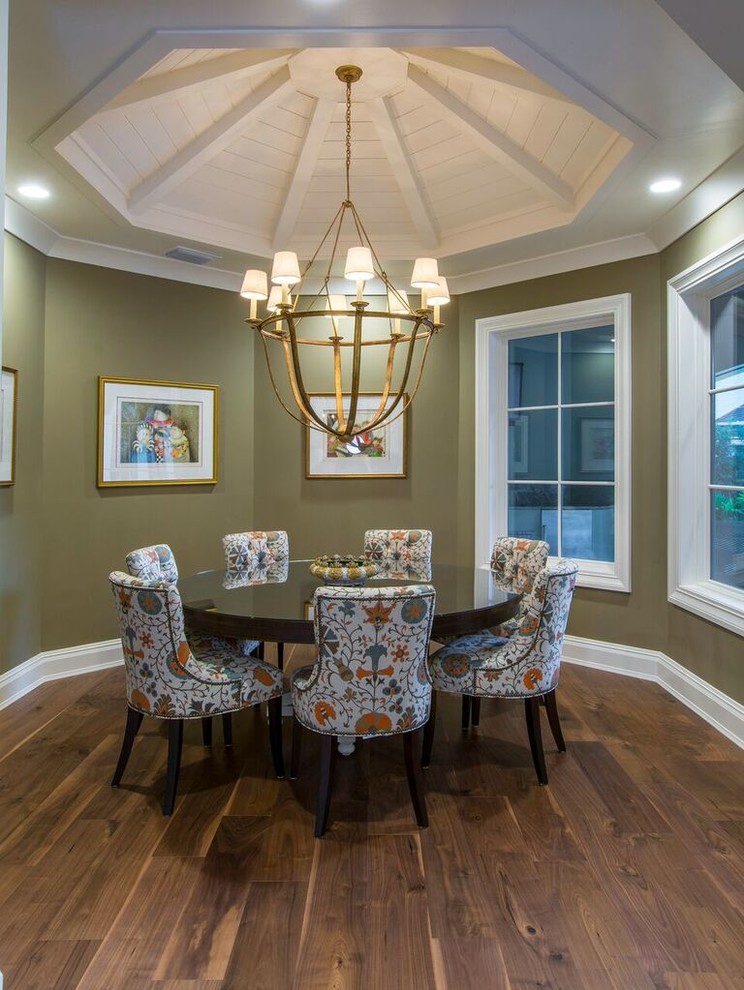 Photo of a large contemporary kitchen/dining combo in Tampa with beige walls and dark hardwood floors.