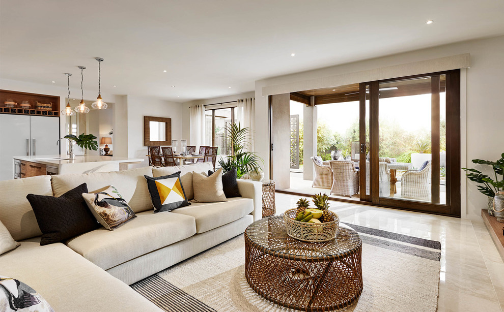 This is an example of a beach style living room in Melbourne.