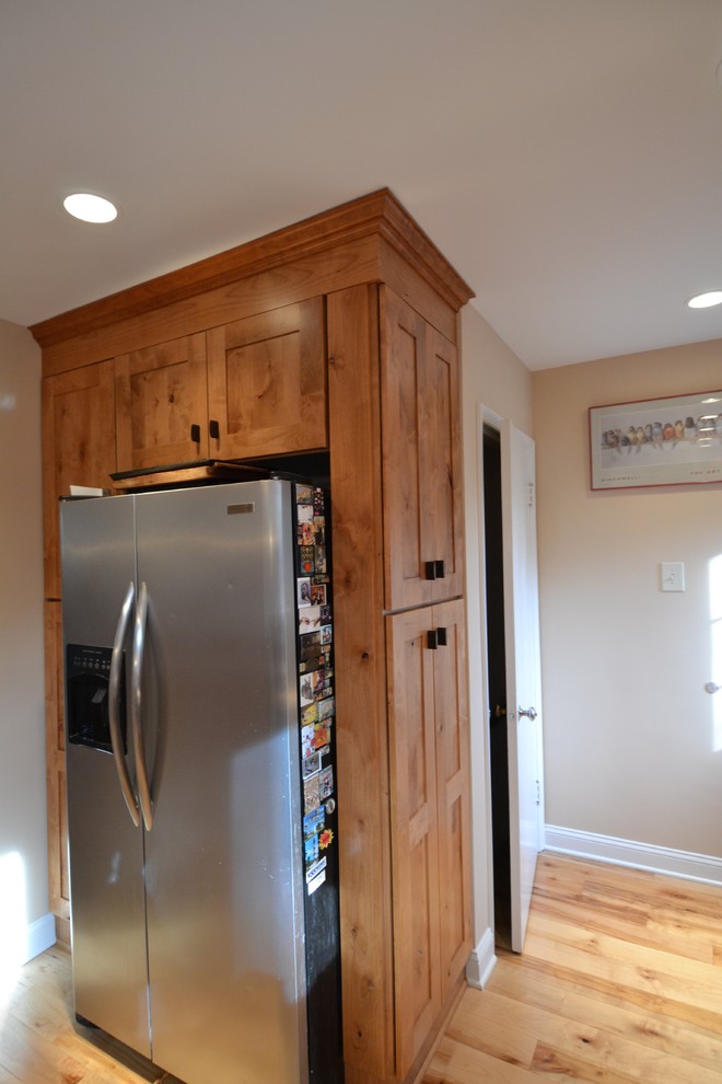 Kitchen with knotty alder cabinets