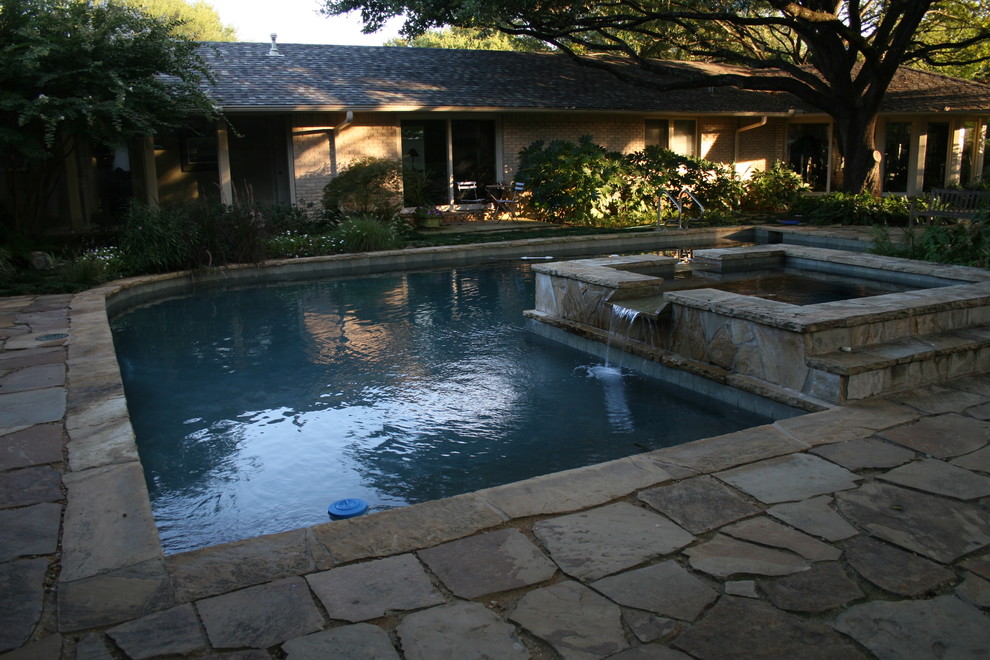 Inspiration for a rustic pool remodel in Dallas