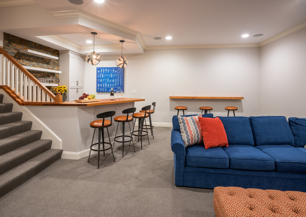 Example of a transitional home design design in Boston