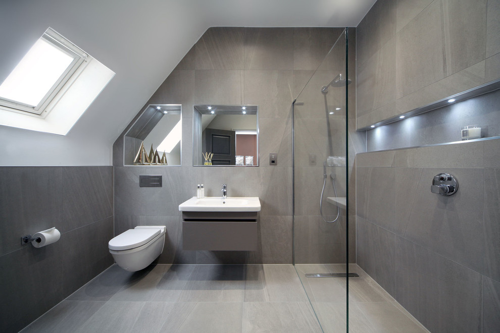 Design ideas for a mid-sized contemporary 3/4 bathroom in London with an open shower, a wall-mount toilet, a wall-mount sink and an open shower.