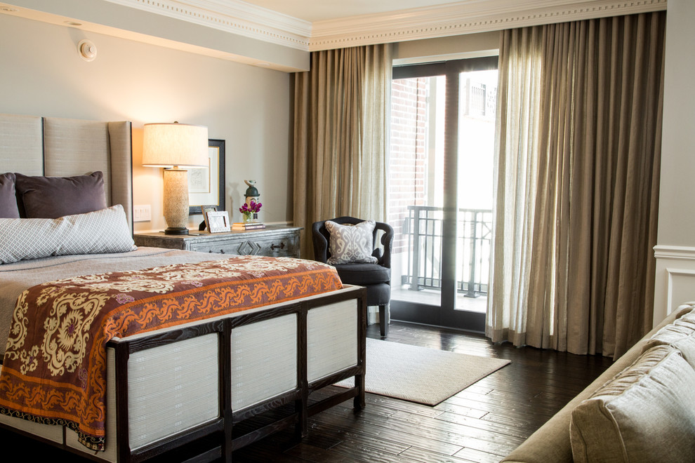 This is an example of a transitional bedroom in Baltimore with beige walls and dark hardwood floors.