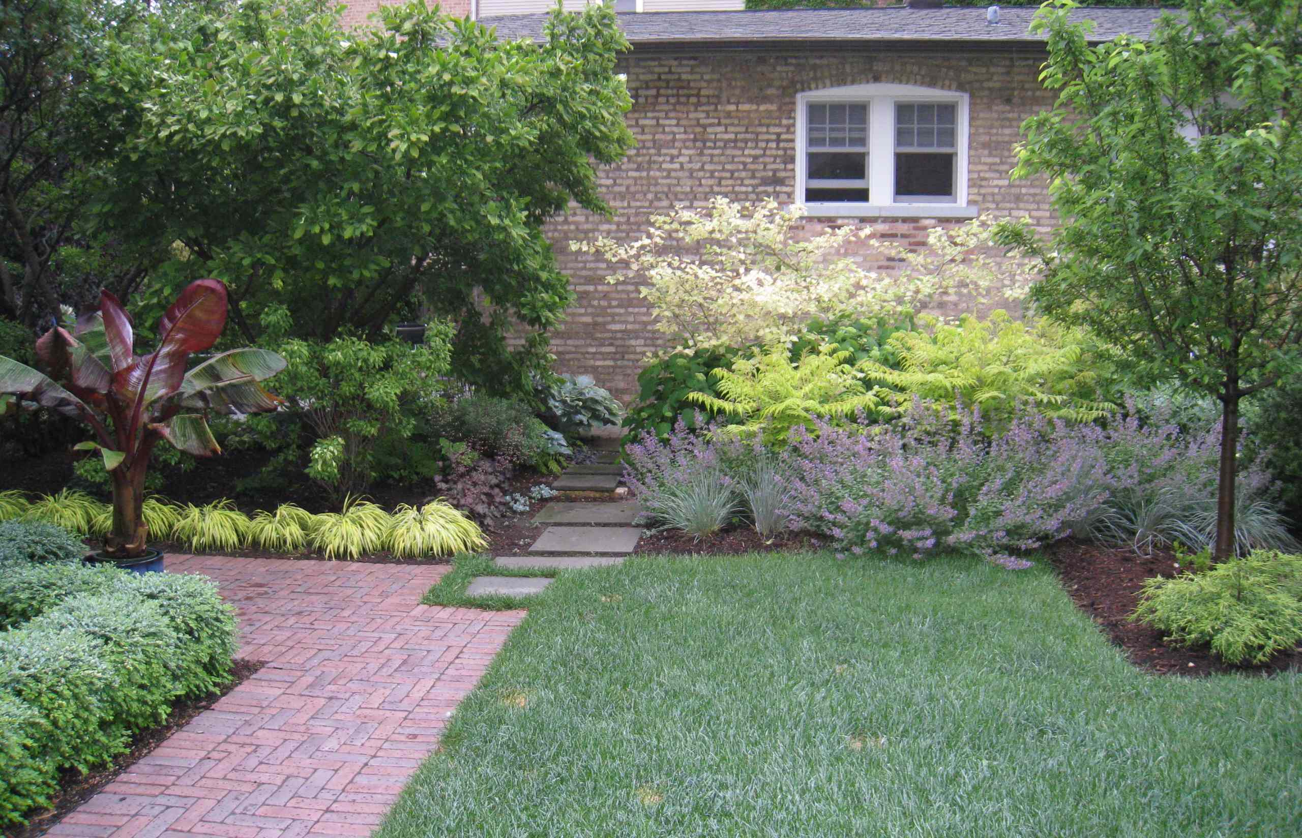 Plant beds separating the two properties
