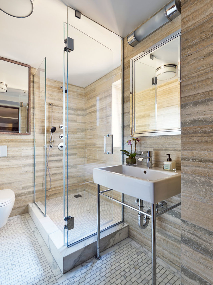 Design ideas for a contemporary bathroom in New York with a corner shower, brown tile, marble, mosaic tile floors, a console sink, white floor and a hinged shower door.