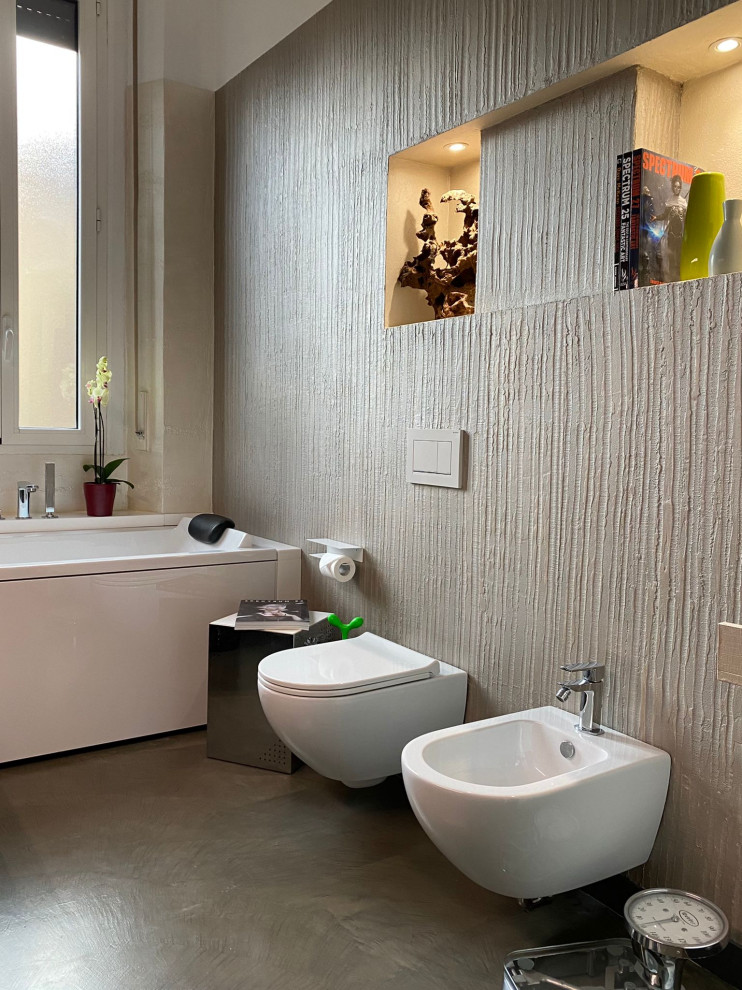 Foto di una grande stanza da bagno padronale bohémian con vasca idromassaggio e pareti beige