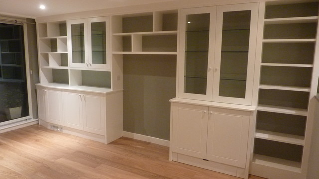 Wall To Wall Storage Including Glass Cabinets Contemporary