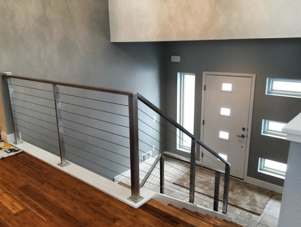 Inspiration for a mid-sized wooden curved staircase remodel