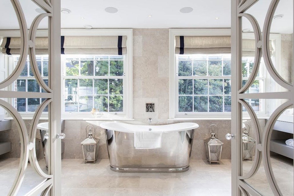 Transitional 3/4 bathroom in London with open cabinets, a freestanding tub, beige tile, beige walls and bamboo floors.