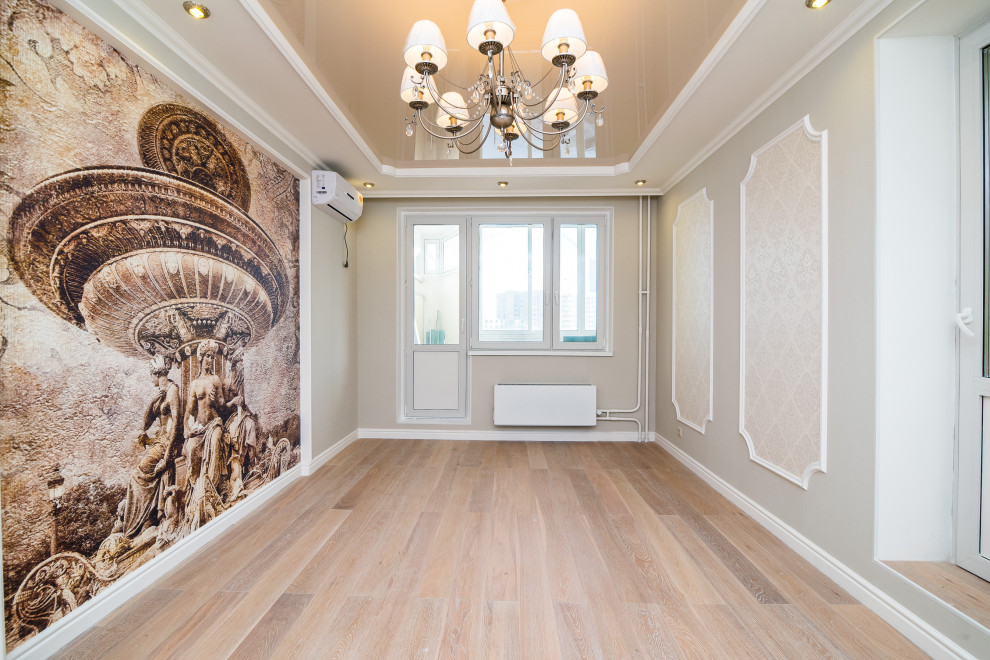 Ejemplo de dormitorio blanco y madera actual de tamaño medio sin chimenea con paredes blancas, suelo de madera en tonos medios y suelo beige