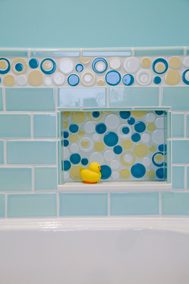 Alcove bathtub - large transitional kids' blue tile and ceramic tile porcelain tile alcove bathtub idea in Minneapolis with flat-panel cabinets, white cabinets, blue walls, an undermount sink and granite countertops