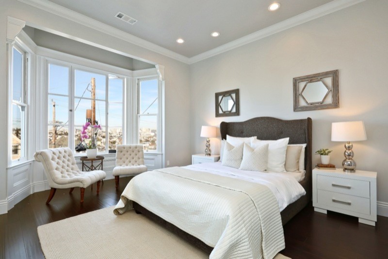 Design ideas for a large contemporary master bedroom in San Francisco with grey walls, dark hardwood floors and no fireplace.