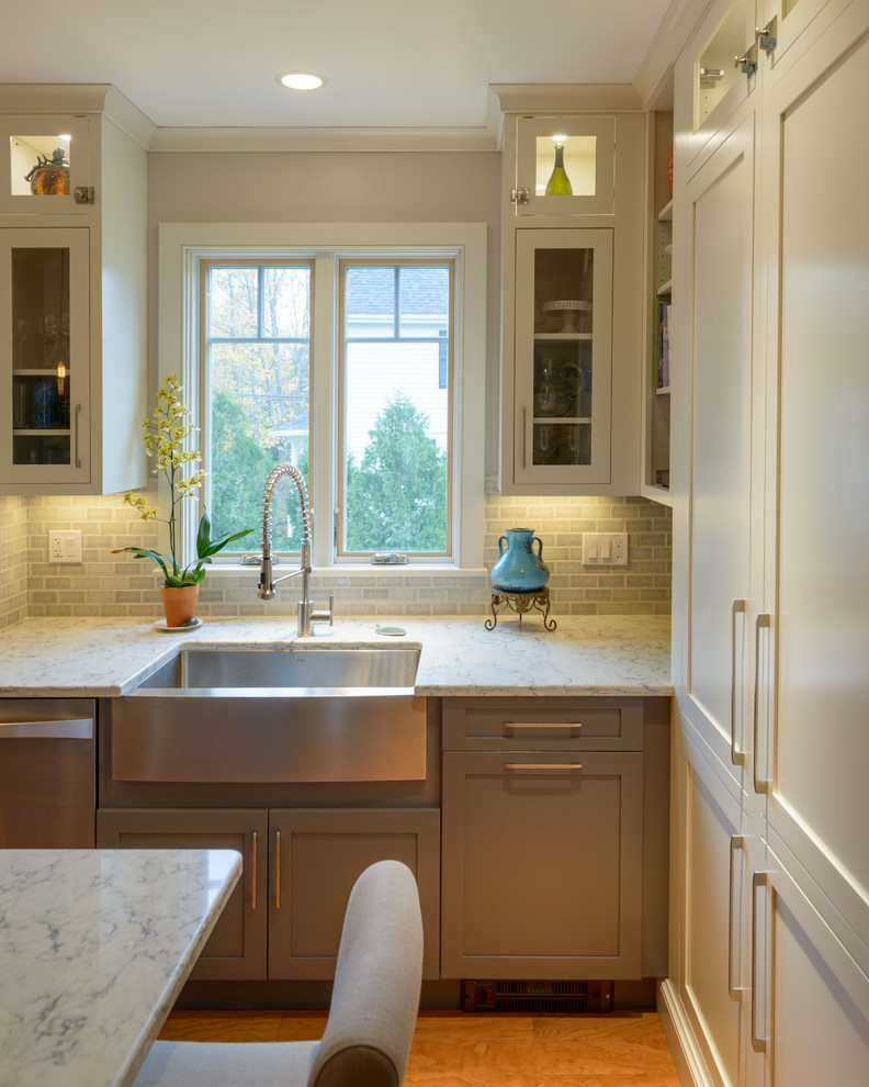 Example of a transitional kitchen design in Boston with a farmhouse sink