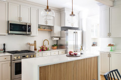 Refinished Cabinets Give a Row House Kitchen a Fresh Look