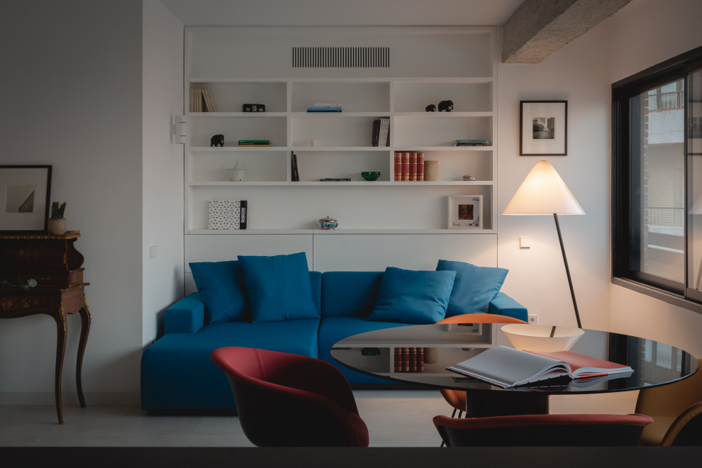 Immagine di un soggiorno design di medie dimensioni e aperto con pavimento in gres porcellanato