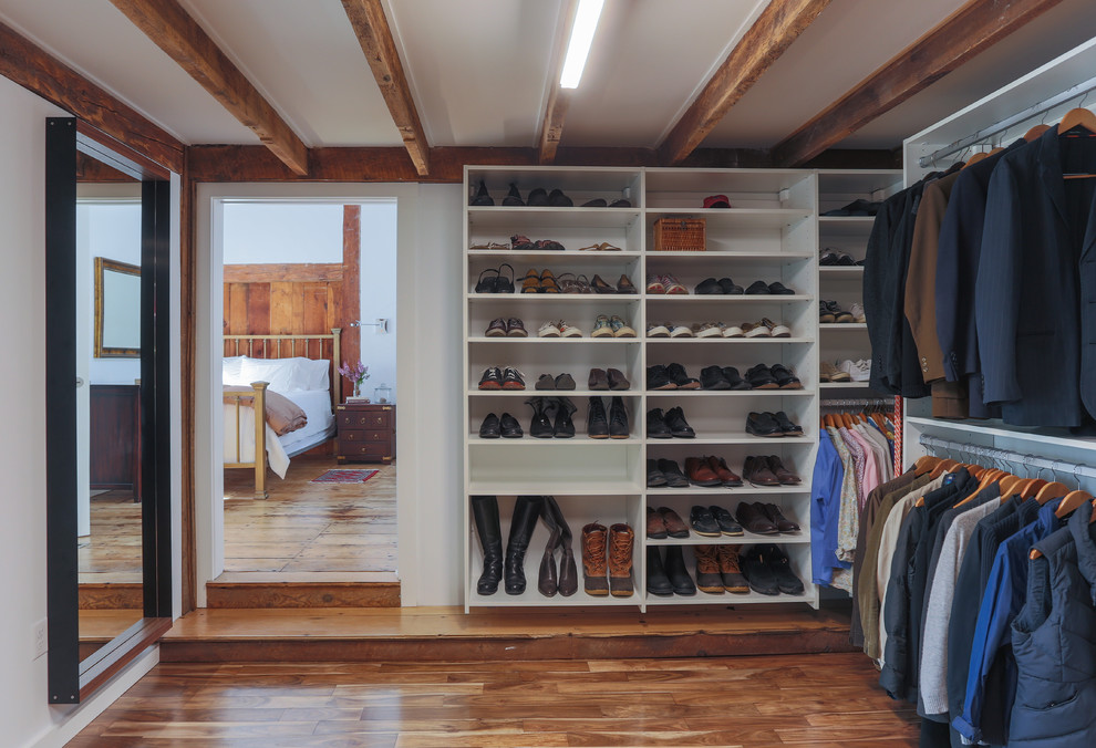 This is an example of a large country storage and wardrobe in Boston.