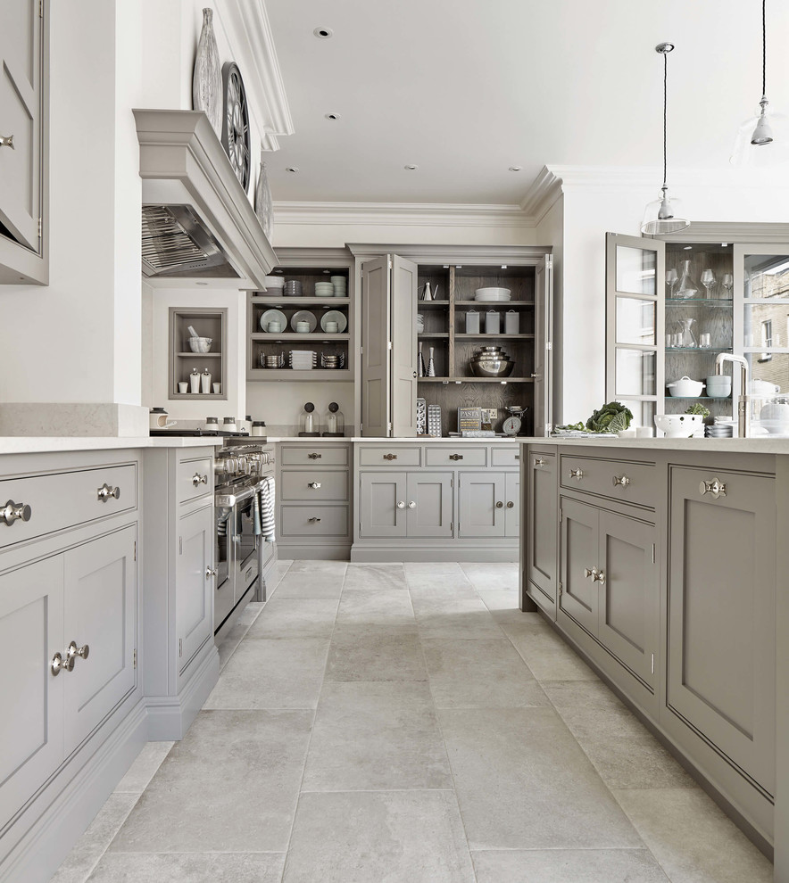 Design ideas for a large contemporary l-shaped eat-in kitchen in Cambridgeshire with a drop-in sink, shaker cabinets, grey cabinets, quartzite benchtops, stainless steel appliances, porcelain floors, with island, beige floor and white benchtop.