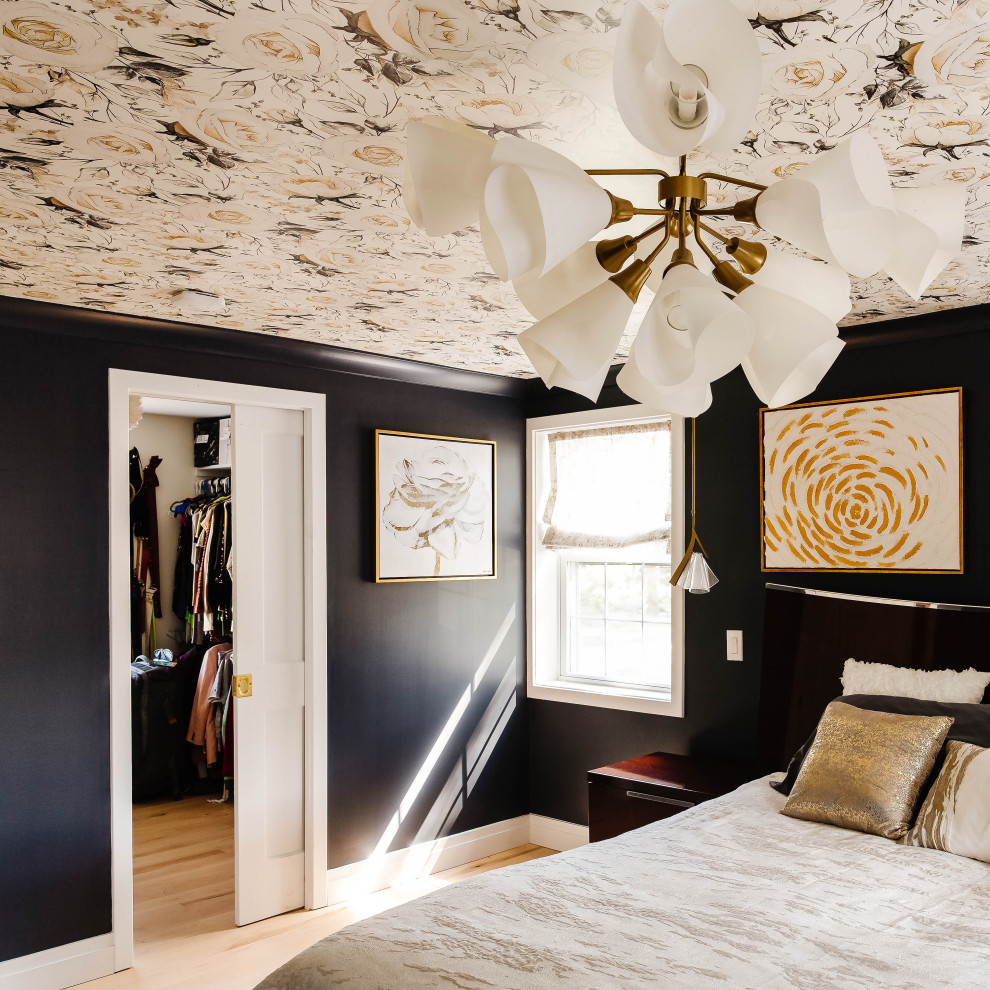 Design ideas for a large eclectic master bedroom in DC Metro with wallpaper.