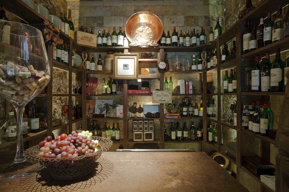 This is an example of a tropical wine cellar in Other.