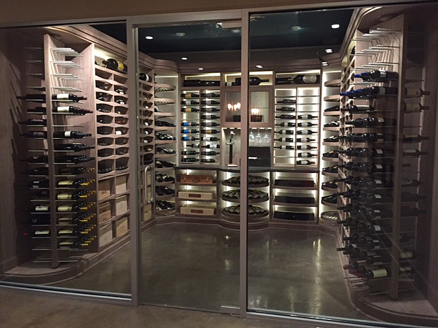 Inspiration for a transitional wine cellar in Nashville with display racks.