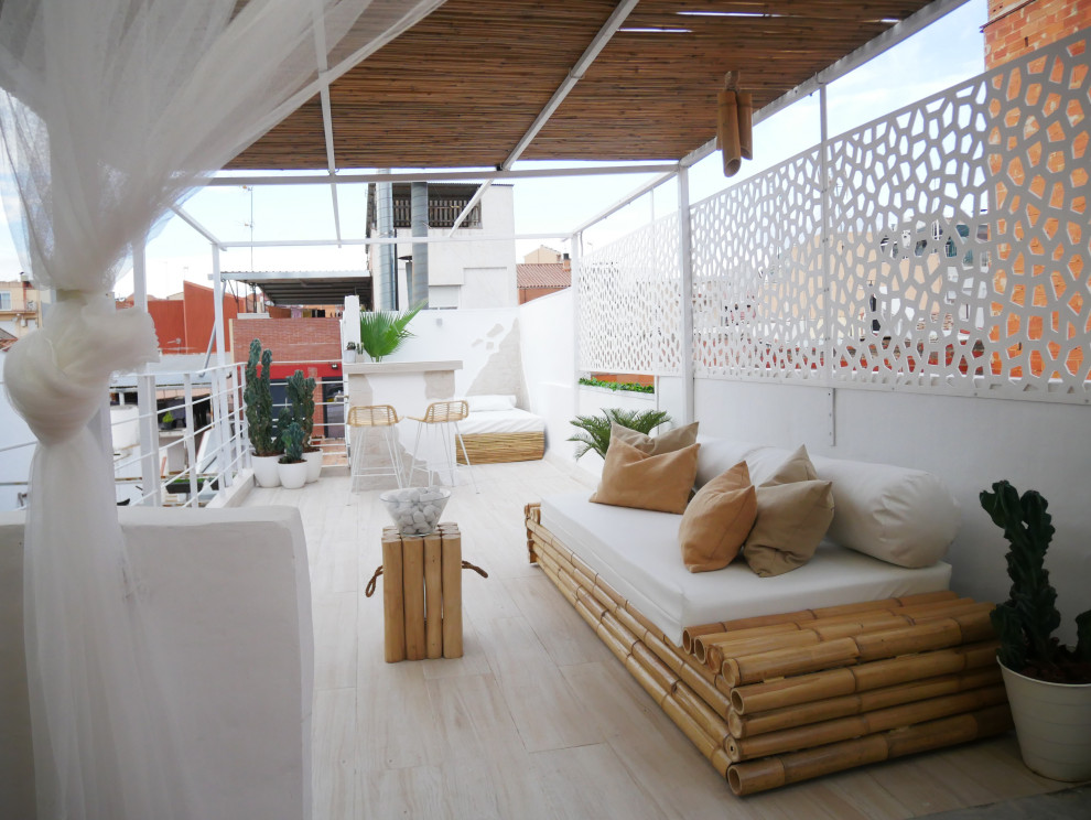 Inspiration for a mediterranean rooftop deck in Barcelona.
